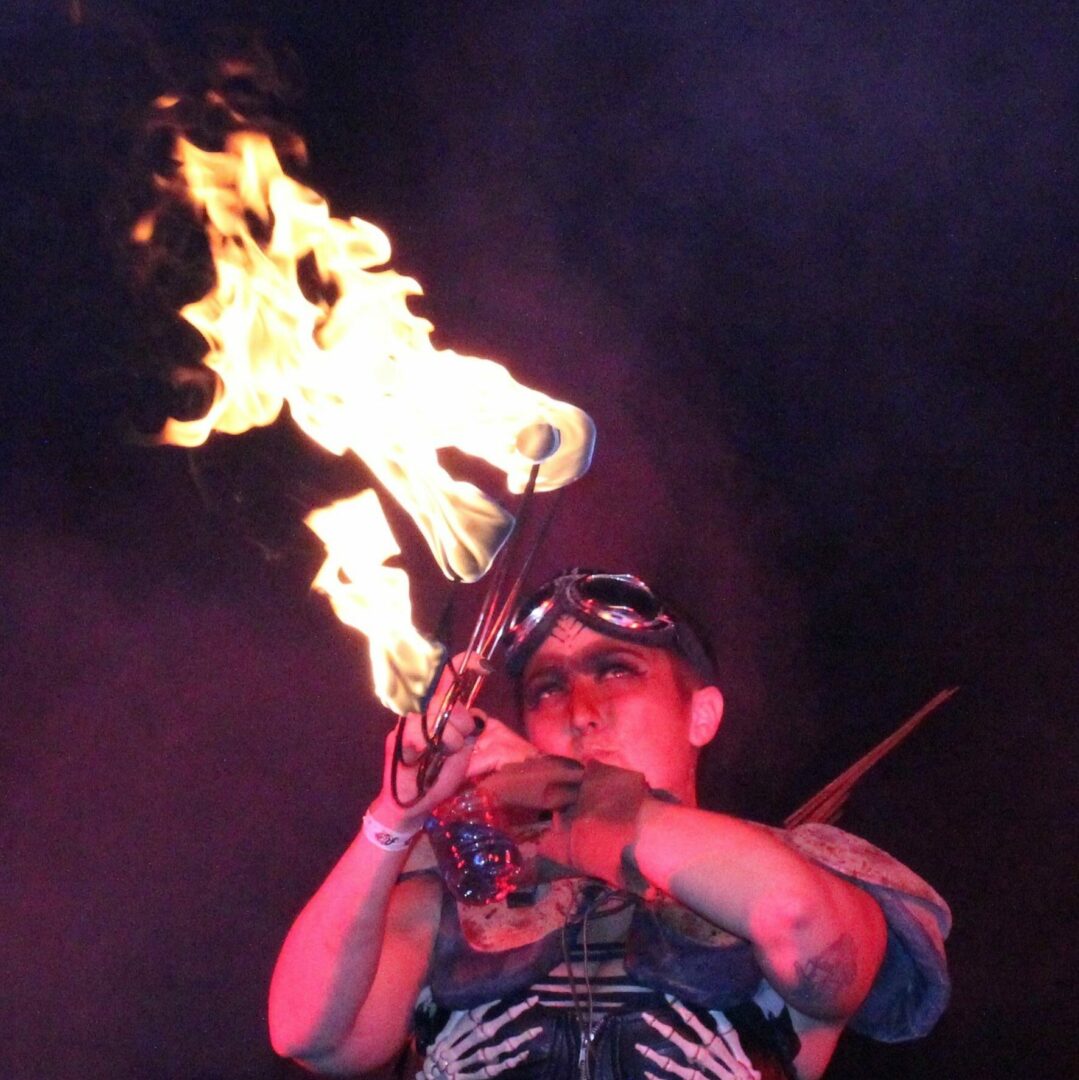 H2X water show fire circus performer